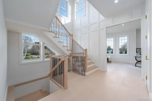 a bathroom with a double vanity sink mirror double and shower