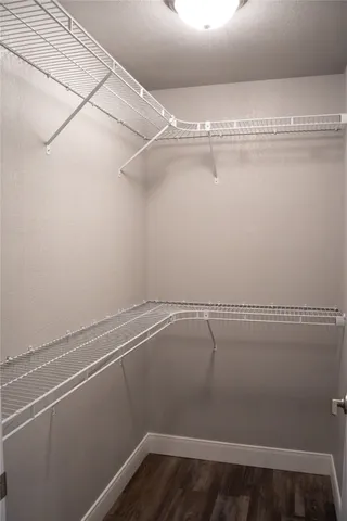 a view of a room with racks on the wall