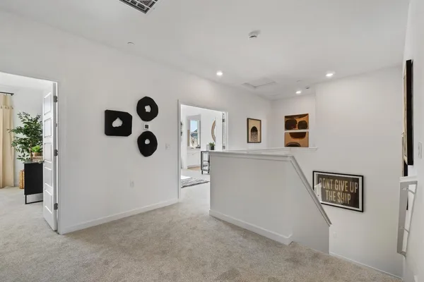 a view of a hallway with closet
