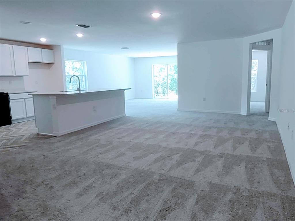 108 West Goldcoast Place Dunnellon, FL 34434 - Photo 18 of 26 a view of an empty room with kitchen