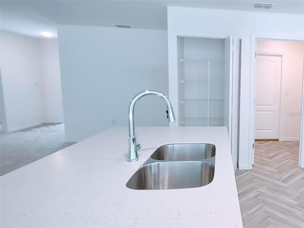 108 West Goldcoast Place Dunnellon, FL 34434 - Photo 19 of 26 a kitchen with a sink and tap