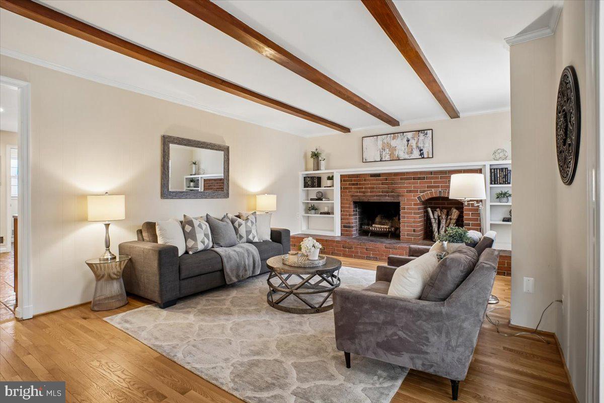 10113 Cardinal Road Fairfax, VA 22030 - Photo 15 of 59 a living room with furniture and a fireplace