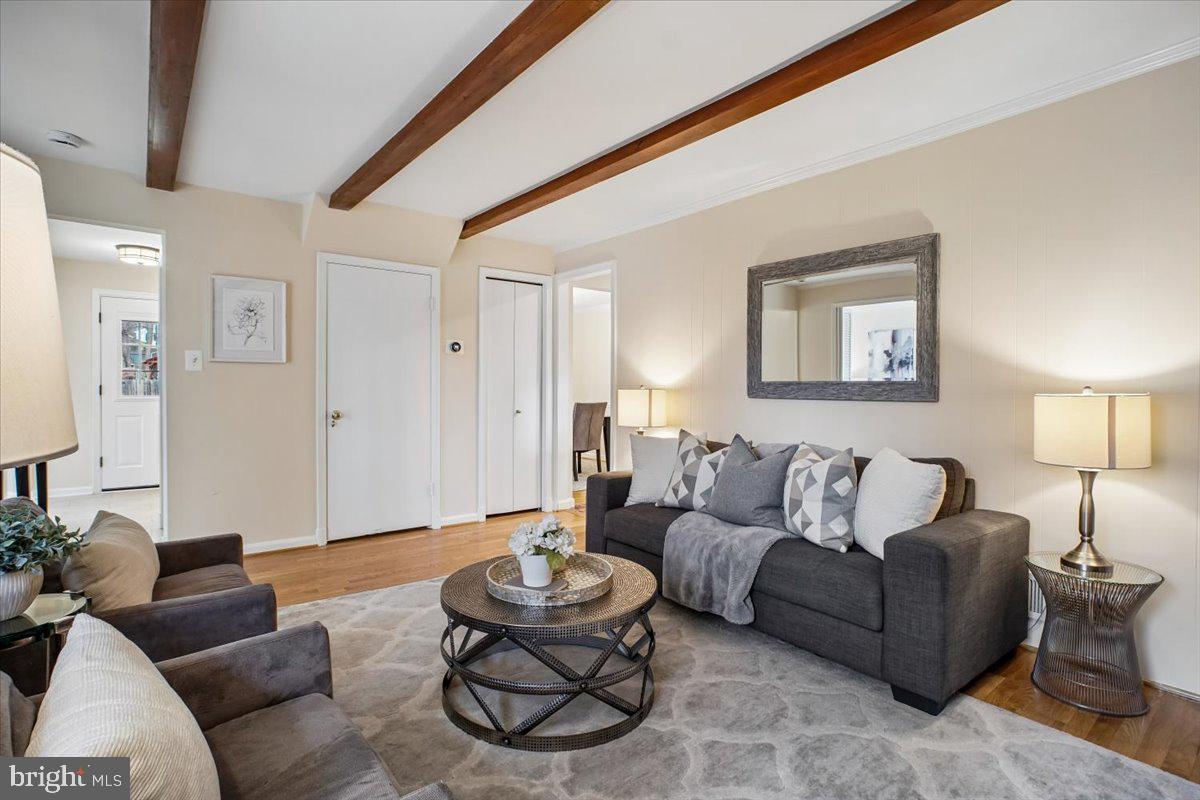 10113 Cardinal Road Fairfax, VA 22030 - Photo 19 of 59 a living room with furniture and a wooden floor