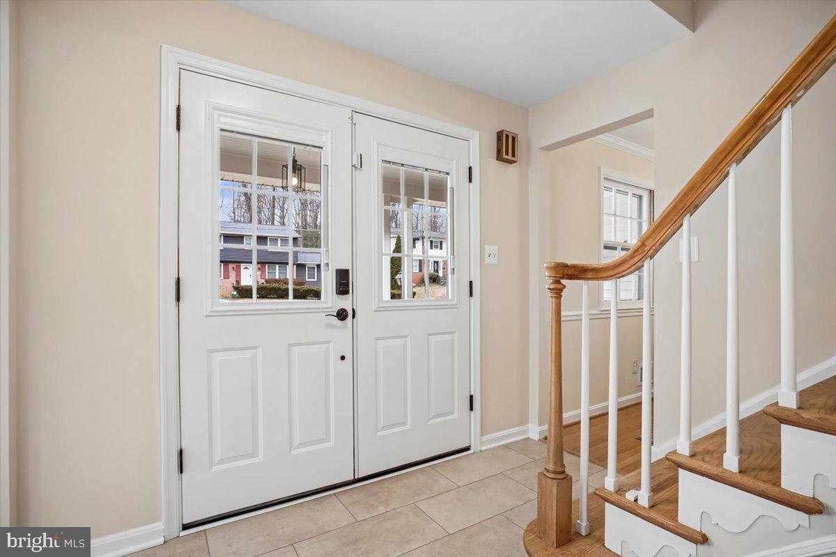 10113 Cardinal Road Fairfax, VA 22030 - Photo 3 of 59 a view of front door with hallway