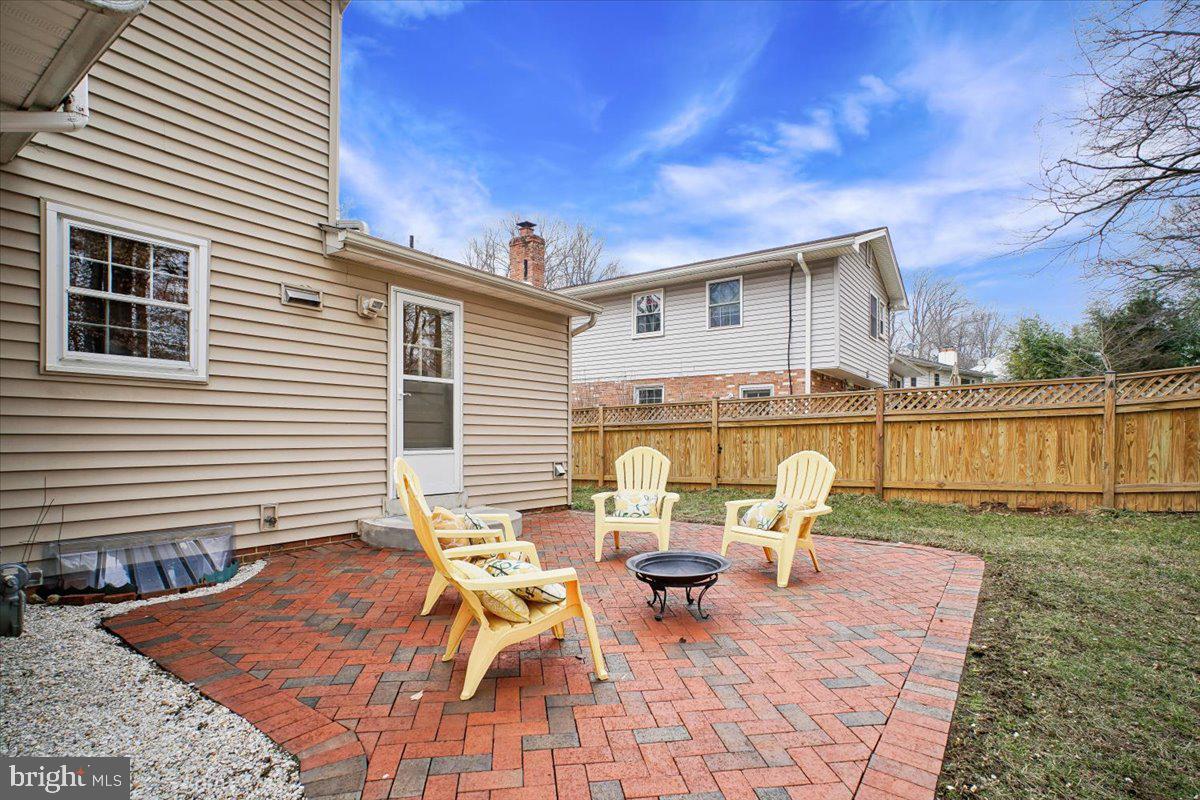 10113 Cardinal Road Fairfax, VA 22030 - Photo 47 of 59 a view of a patio with a table and chairs