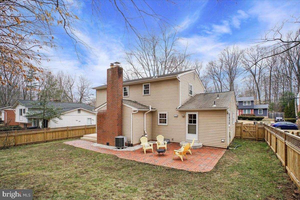 10113 Cardinal Road Fairfax, VA 22030 - Photo 49 of 59 a backyard of a house with outdoor seating