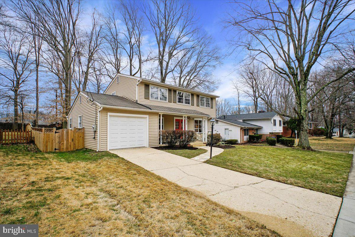 10113 Cardinal Road Fairfax, VA 22030 - Photo 55 of 59 a view of a house with a yard covered trees