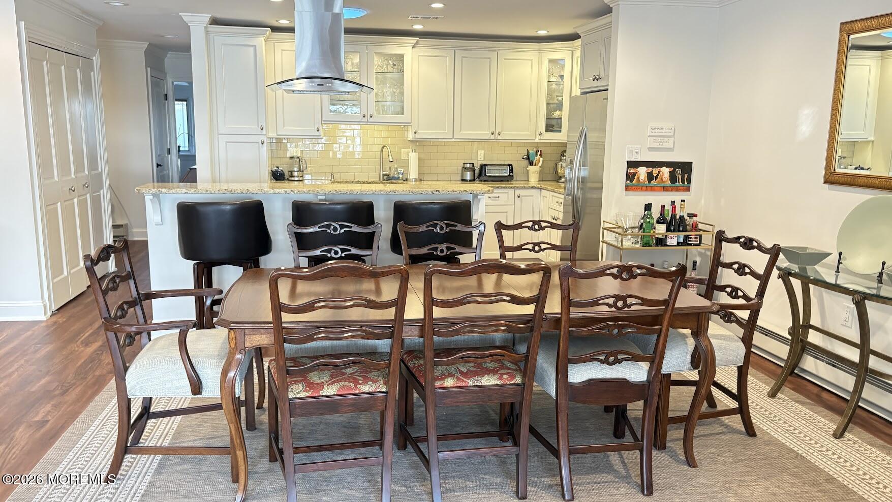 29 Dickinson Court Red Bank, NJ 07701 - Photo 12 of 36 a view of a dining room with furniture and wooden floor