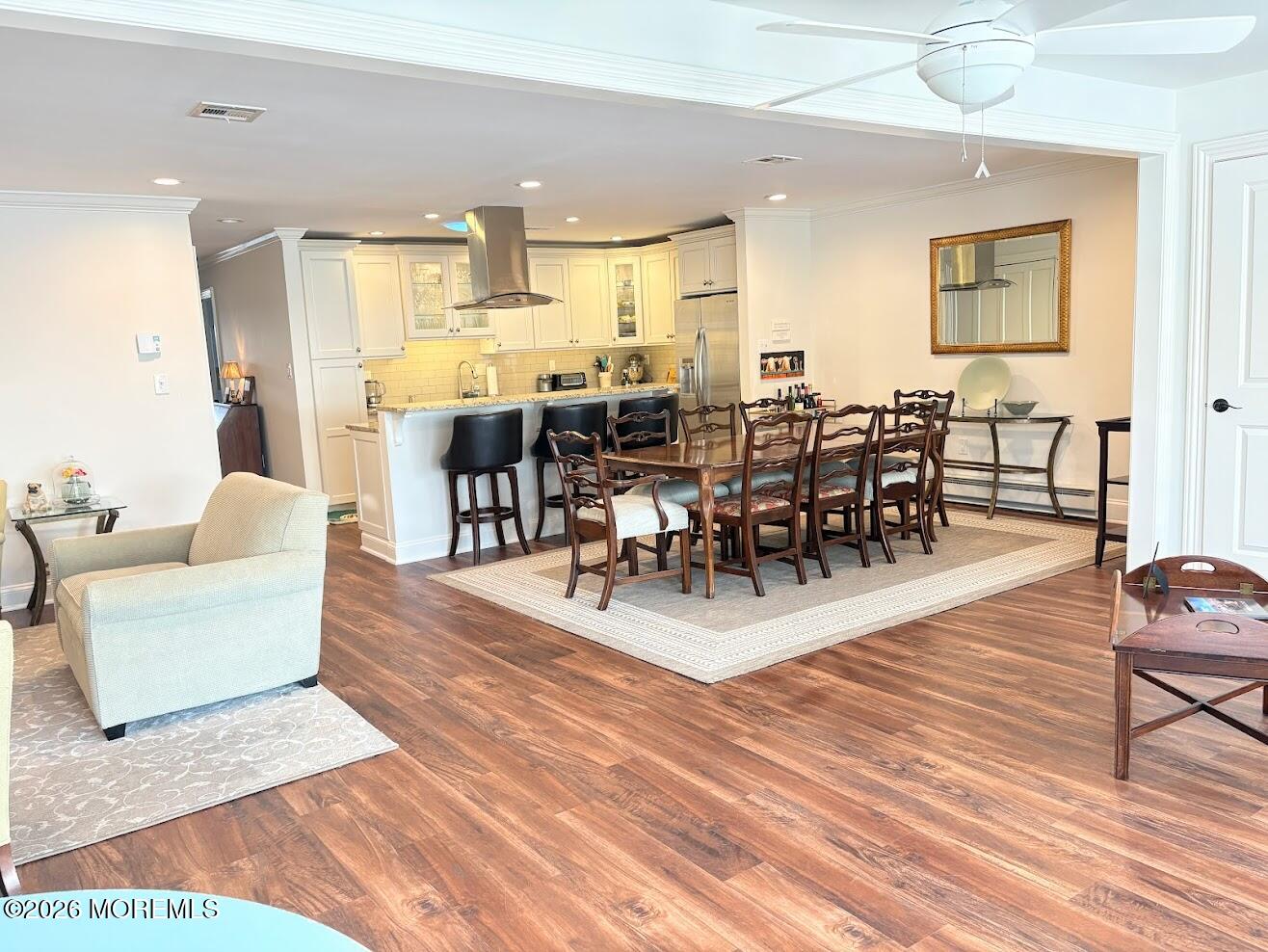 29 Dickinson Court Red Bank, NJ 07701 - Photo 14 of 36 a view of a dining room with furniture wooden floor and windows