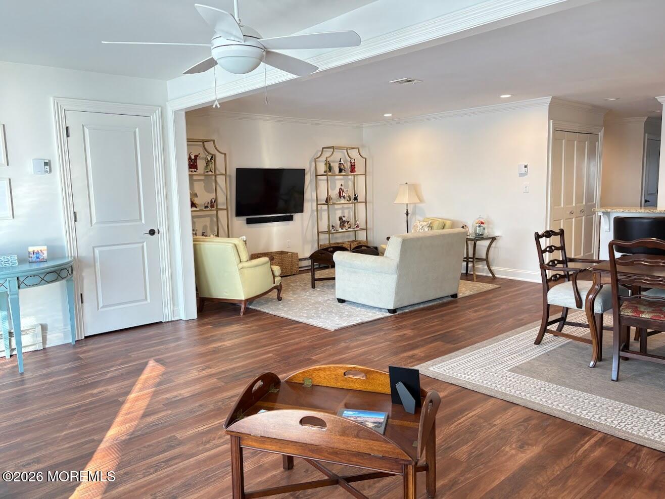 29 Dickinson Court Red Bank, NJ 07701 - Photo 15 of 36 a living room with furniture and a flat screen tv