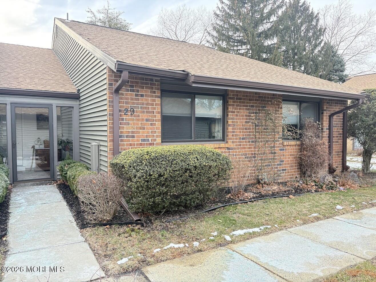 29 Dickinson Court Red Bank, NJ 07701 - Photo 2 of 36 a front view of a house with garden