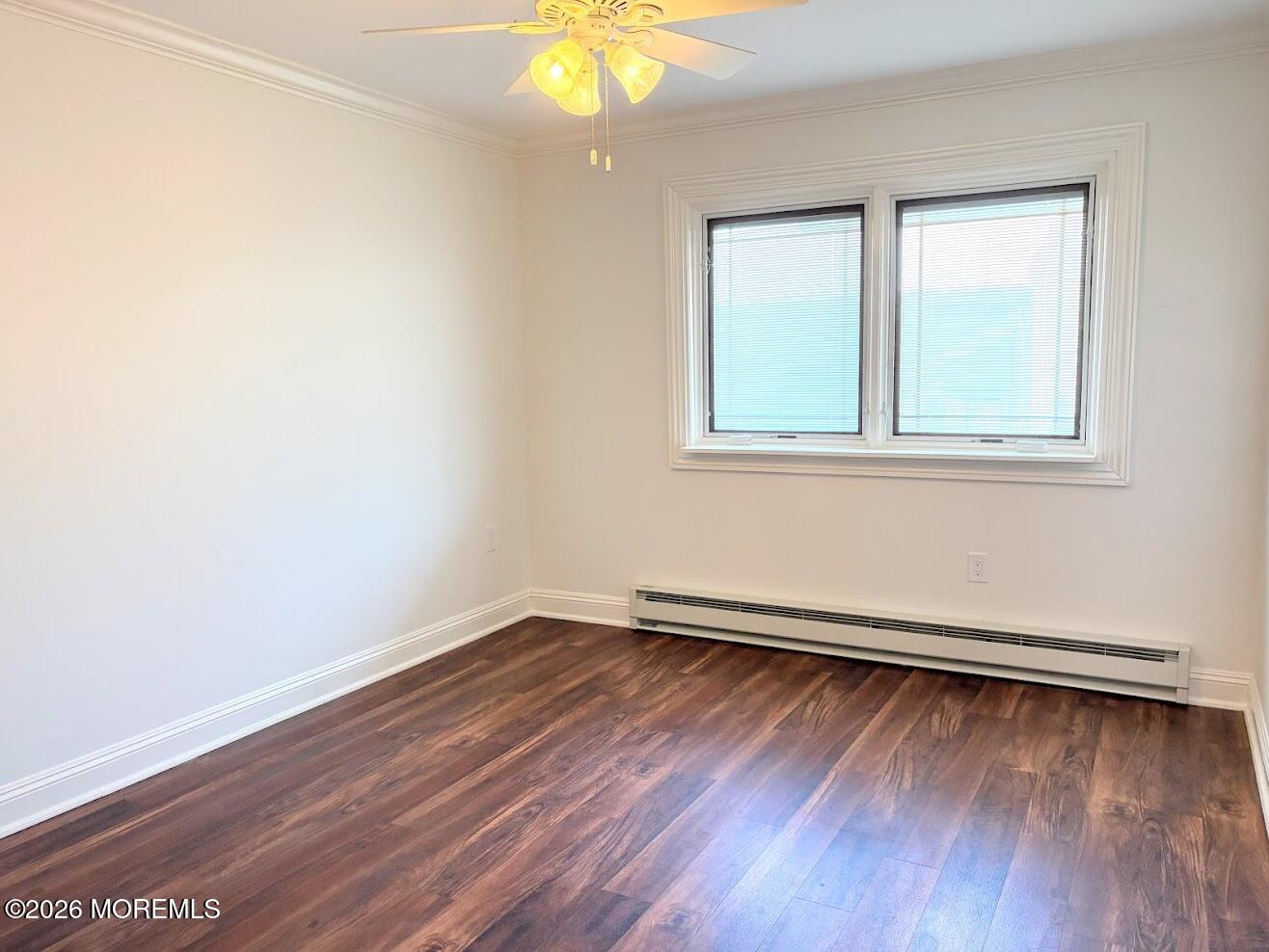 29 Dickinson Court Red Bank, NJ 07701 - Photo 21 of 36 an empty room with wooden floor and windows