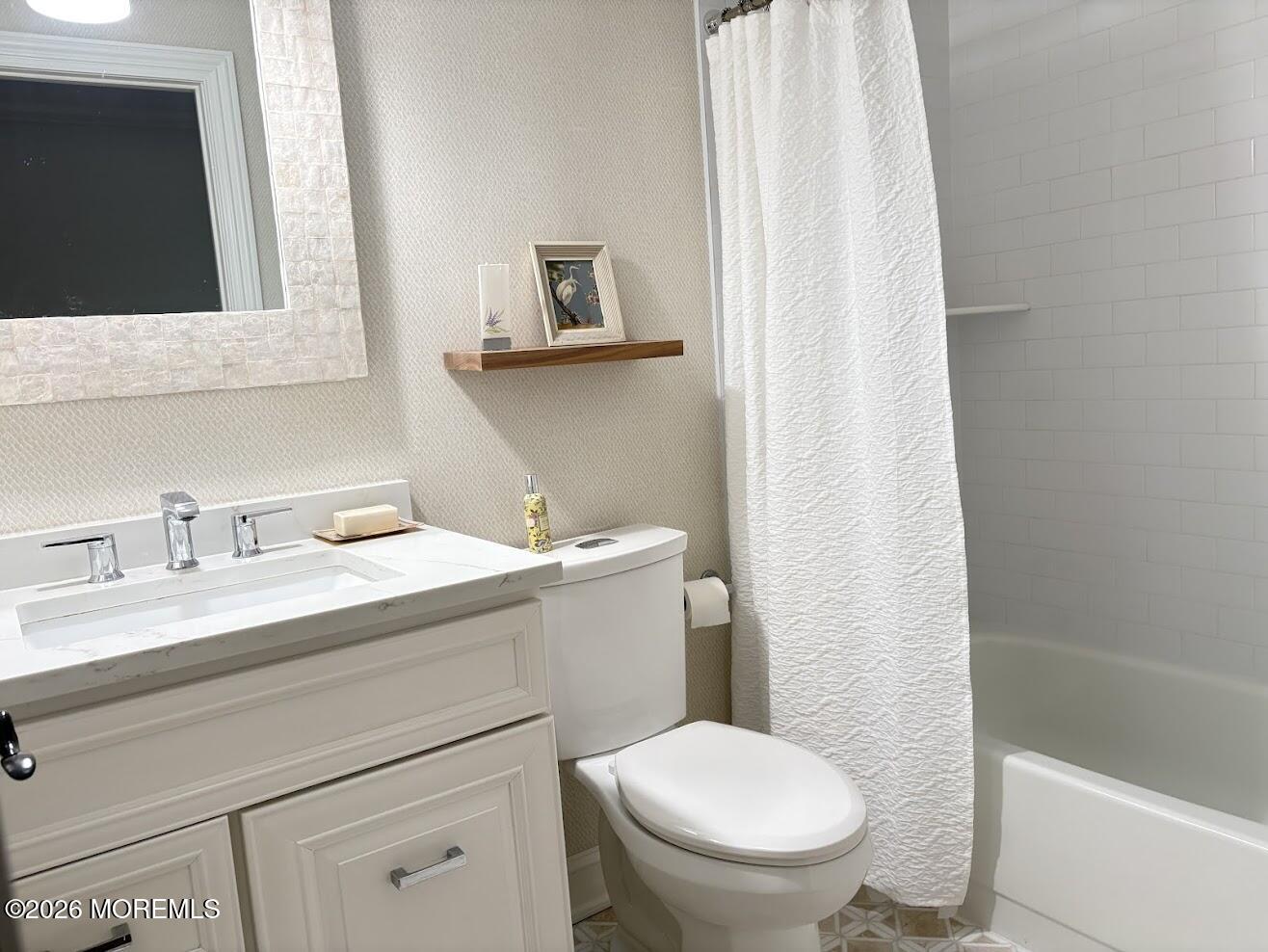 29 Dickinson Court Red Bank, NJ 07701 - Photo 23 of 36 a bathroom with a granite countertop sink a toilet and a mirror