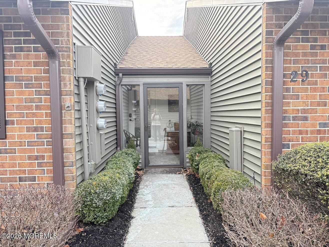 29 Dickinson Court Red Bank, NJ 07701 - Photo 3 of 36 a view of a pathway both side of house