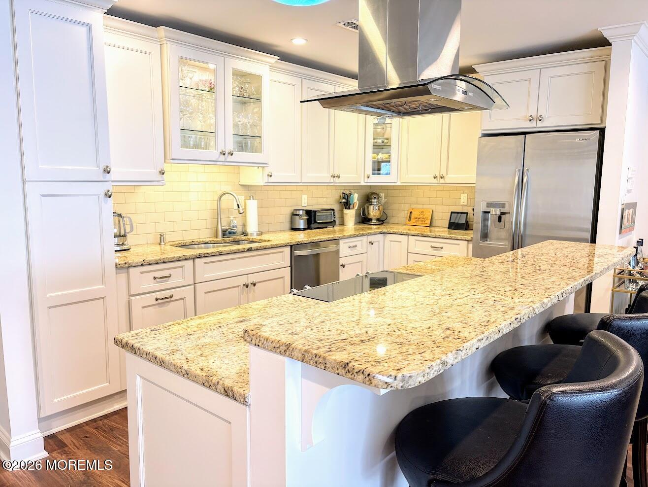 29 Dickinson Court Red Bank, NJ 07701 - Photo 9 of 36 a kitchen with granite countertop sink and lots of white cabinets