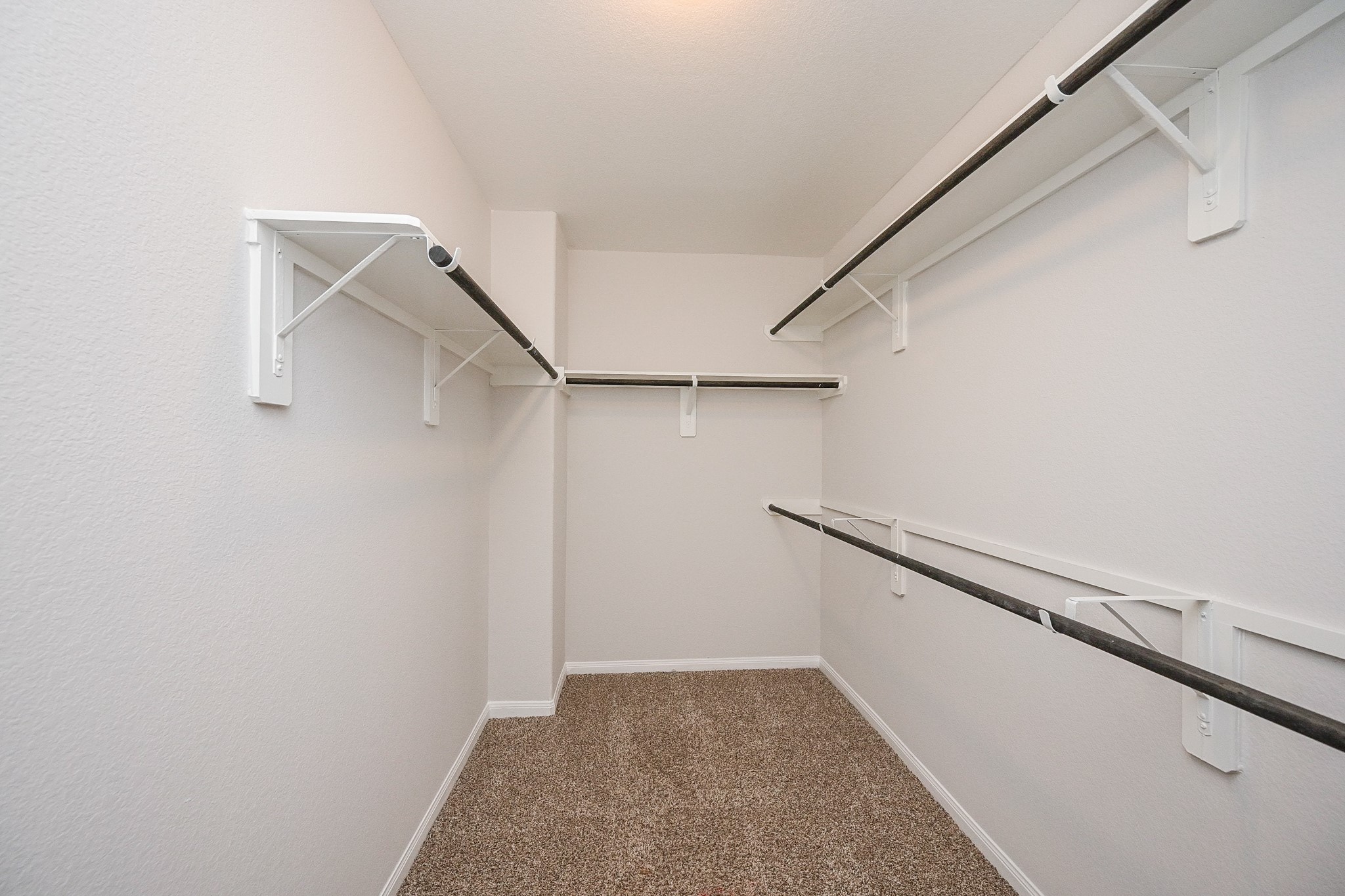 22002 Imperious Parkway Houston, TX 77073 - Photo 12 of 20 a view of an empty walk in closet