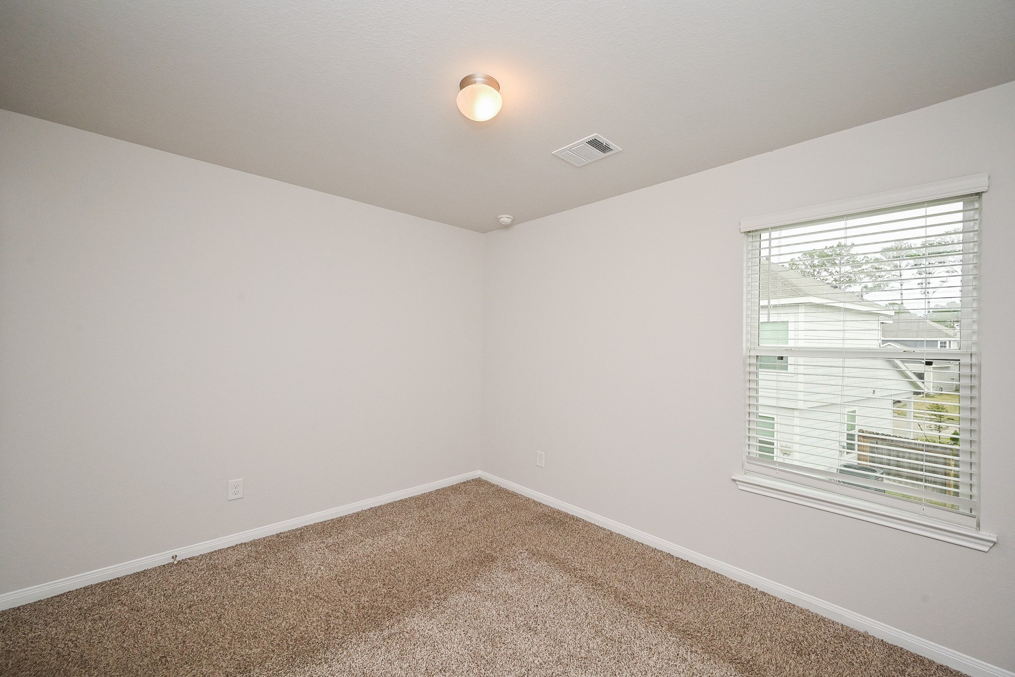 22002 Imperious Parkway Houston, TX 77073 - Photo 14 of 20 a view of a room that has a window in it