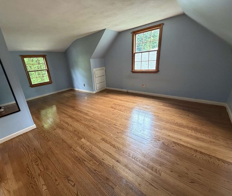 74 Birch Road Longmeadow, MA 01106 - Photo 27 of 38 a view of empty room with window and wooden floor