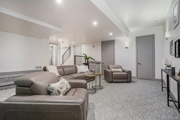 a living room with furniture and a couch