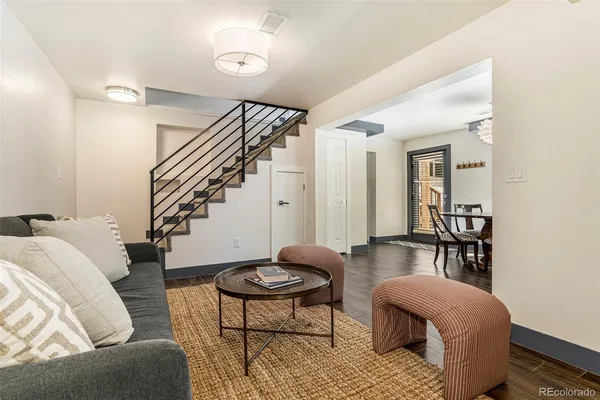 a living room with furniture and a table