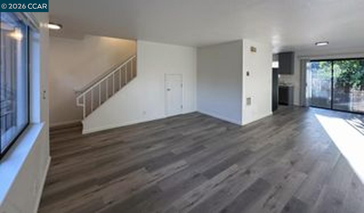568 Dean Street Hayward, CA 94541 - Photo 2 of 17 a view of a hallway with wooden floor and entryway