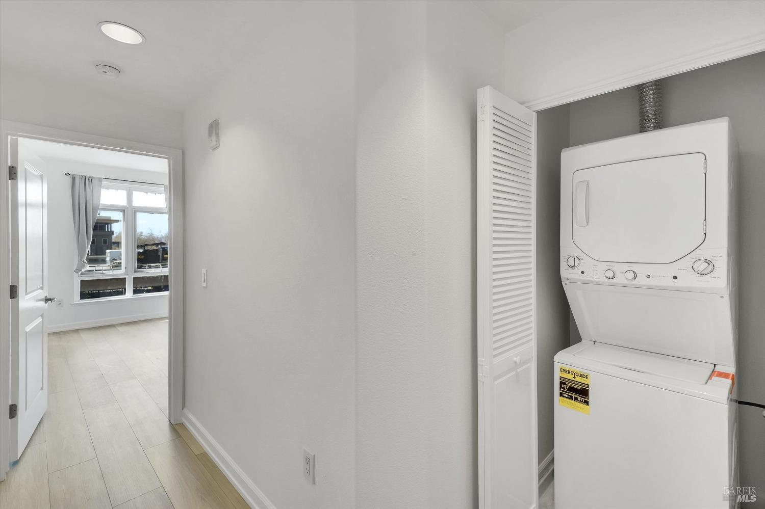423 7th Street, Unit 105 Oakland, CA 94607 - Photo 17 of 28 a utility room with dryer and washer