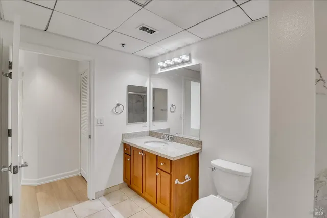 a large building with a bench in front of it