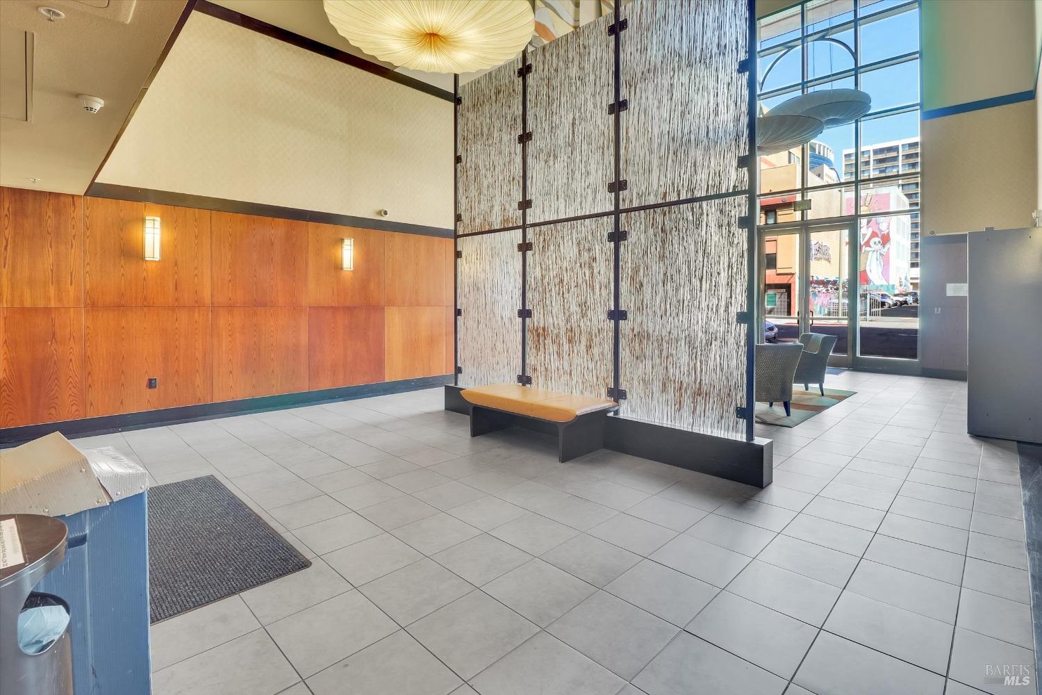 423 7th Street, Unit 105 Oakland, CA 94607 - Photo 3 of 28 a view of an empty room with a window