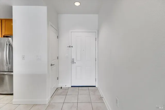 a kitchen with stainless steel appliances granite countertop a sink stove and microwave