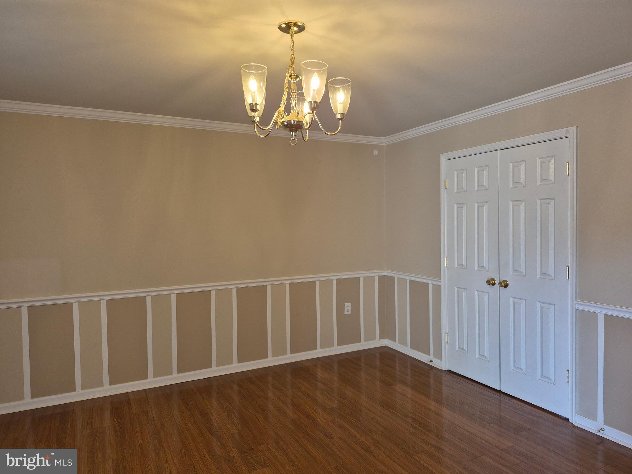 173 Ranson Estates Circle Ranson, WV 25438 - Photo 5 of 20 a view of an empty room with wooden floor