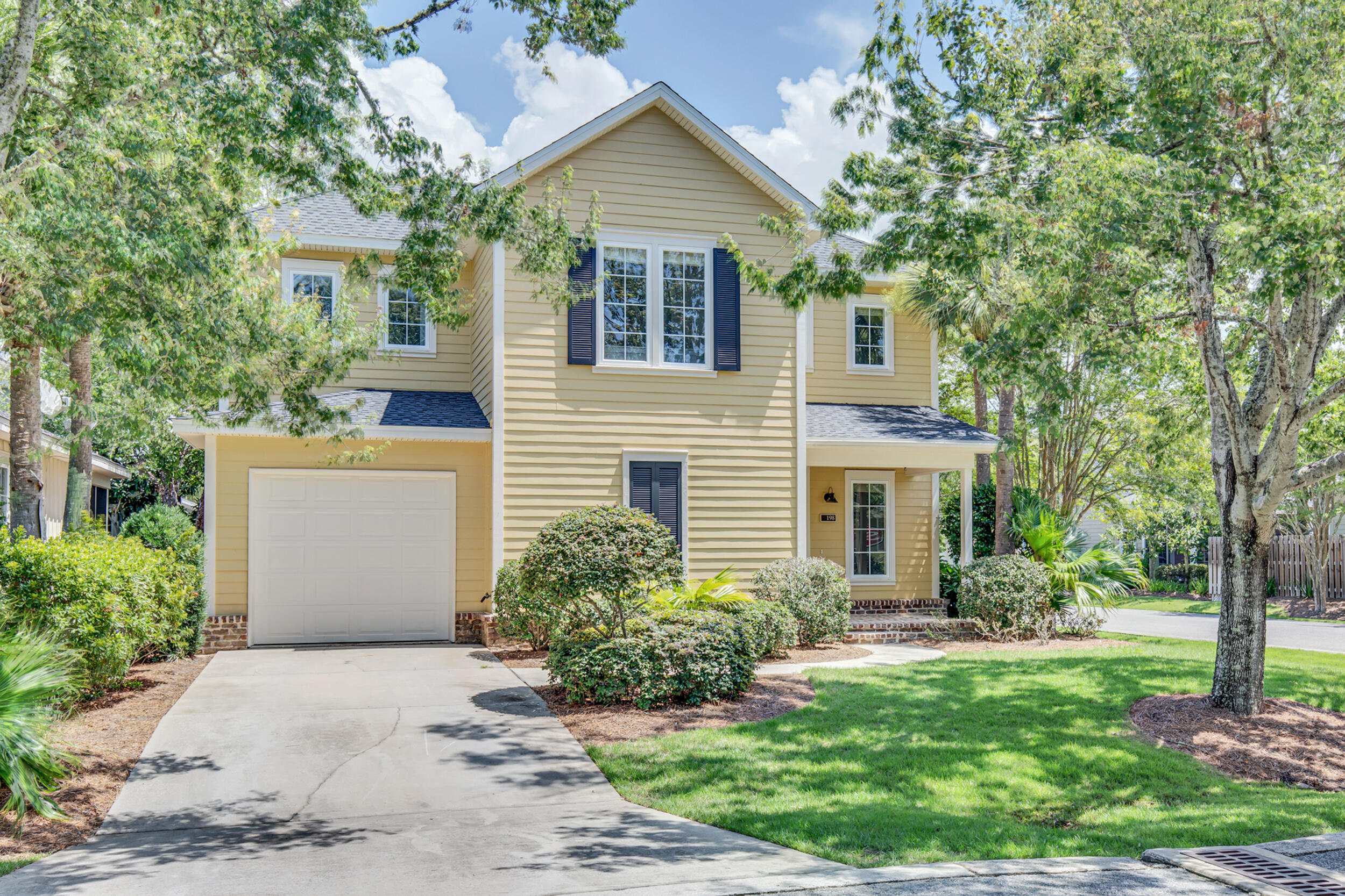 198 South Zander Way Santa Rosa Beach, FL 32459 - Photo 1 of 37 a front view of house with yard and trees