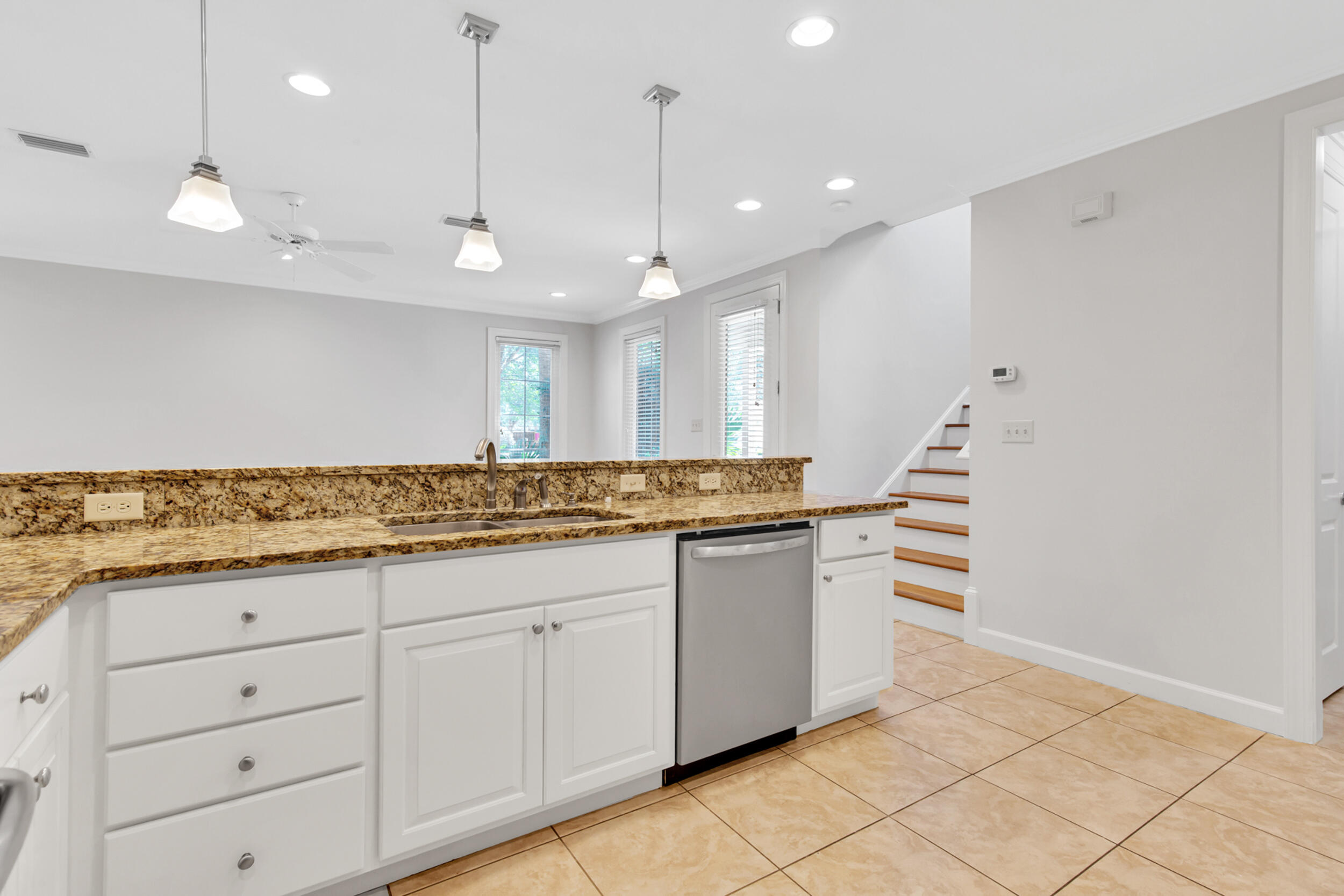 198 South Zander Way Santa Rosa Beach, FL 32459 - Photo 12 of 37 a bathroom with a granite countertop sink and a mirror