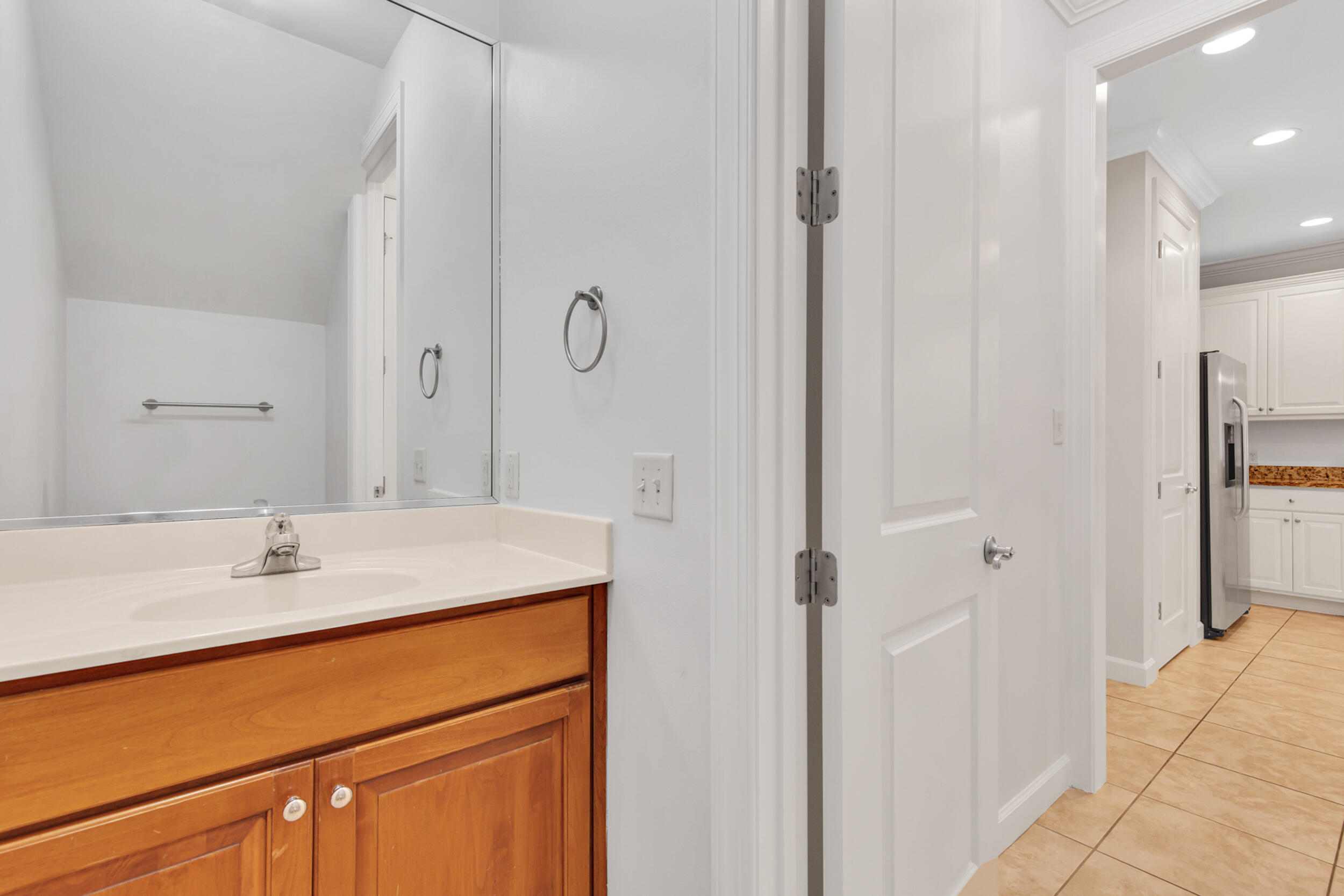 198 South Zander Way Santa Rosa Beach, FL 32459 - Photo 14 of 37 a bathroom with a sink double vanity and a mirror