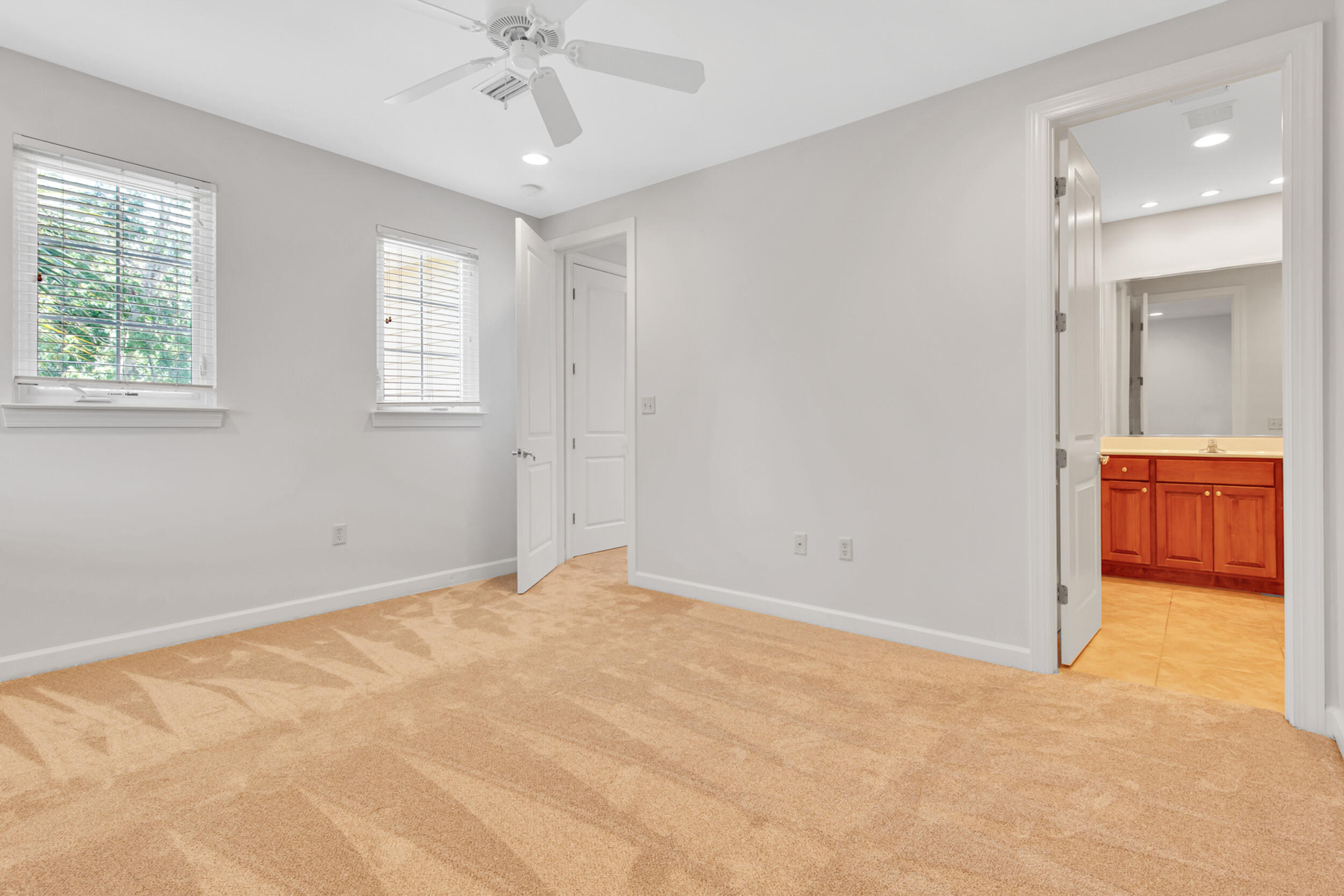 198 South Zander Way Santa Rosa Beach, FL 32459 - Photo 27 of 37 an empty room with fan and windows