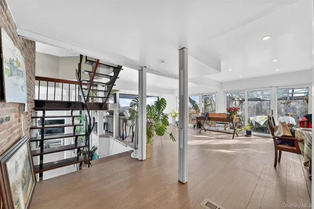 a view of a livingroom with furniture and a rug