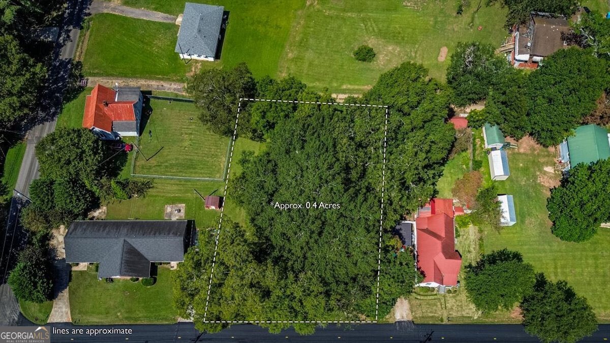172 Scott Street Commerce, GA 30529 - Photo 2 of 10 an aerial view of a house with a yard
