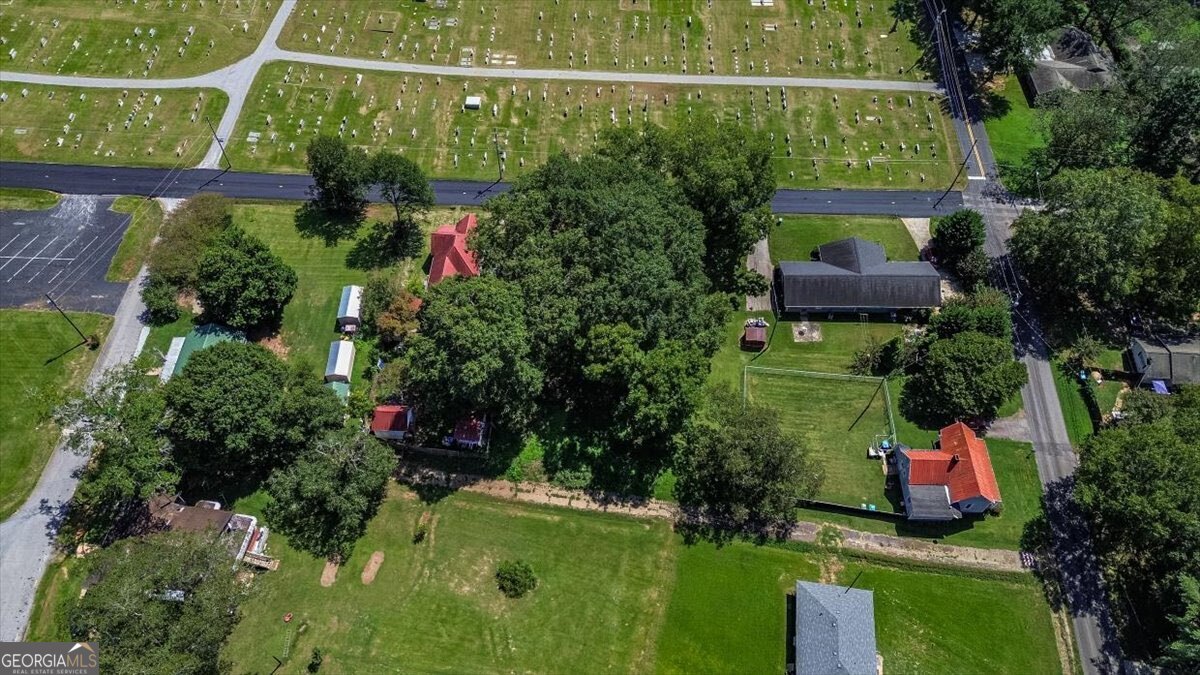 172 Scott Street Commerce, GA 30529 - Photo 6 of 10 an aerial view of residential house with outdoor space and trees