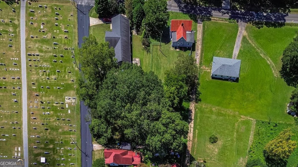 172 Scott Street Commerce, GA 30529 - Photo 8 of 10 an aerial view of a house with a yard basket ball court and outdoor seating