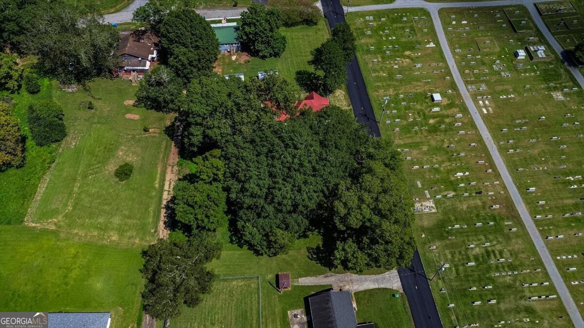 172 Scott Street Commerce, GA 30529 - Photo 9 of 10 an aerial view of residential houses with outdoor space