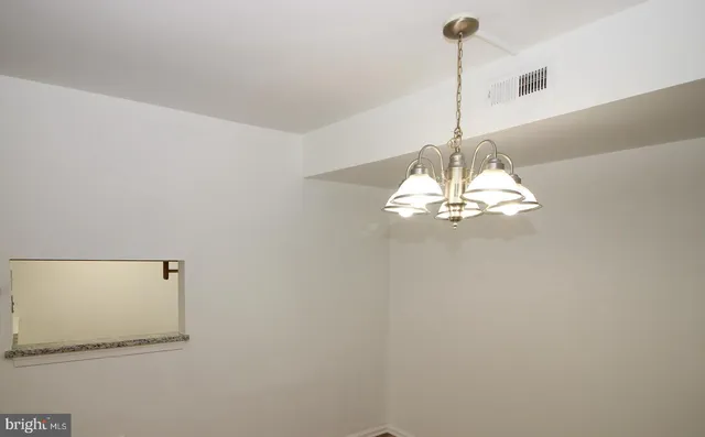 a vase of flowers sitting on a table