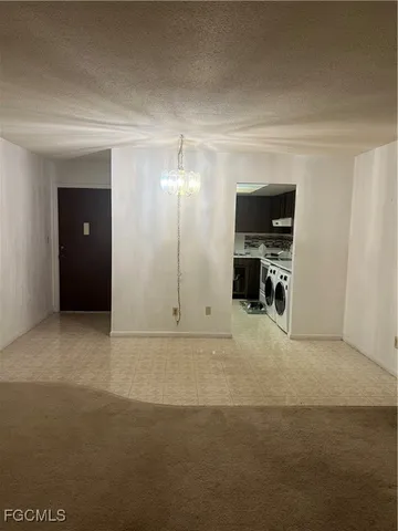 a view of a livingroom with furniture