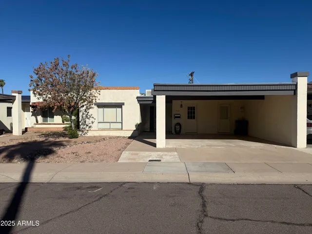 a view of entrance gate of a house