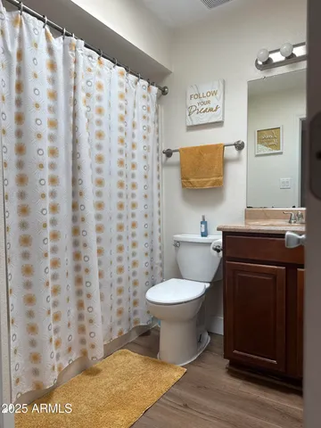 a bathroom with a toilet and a sink