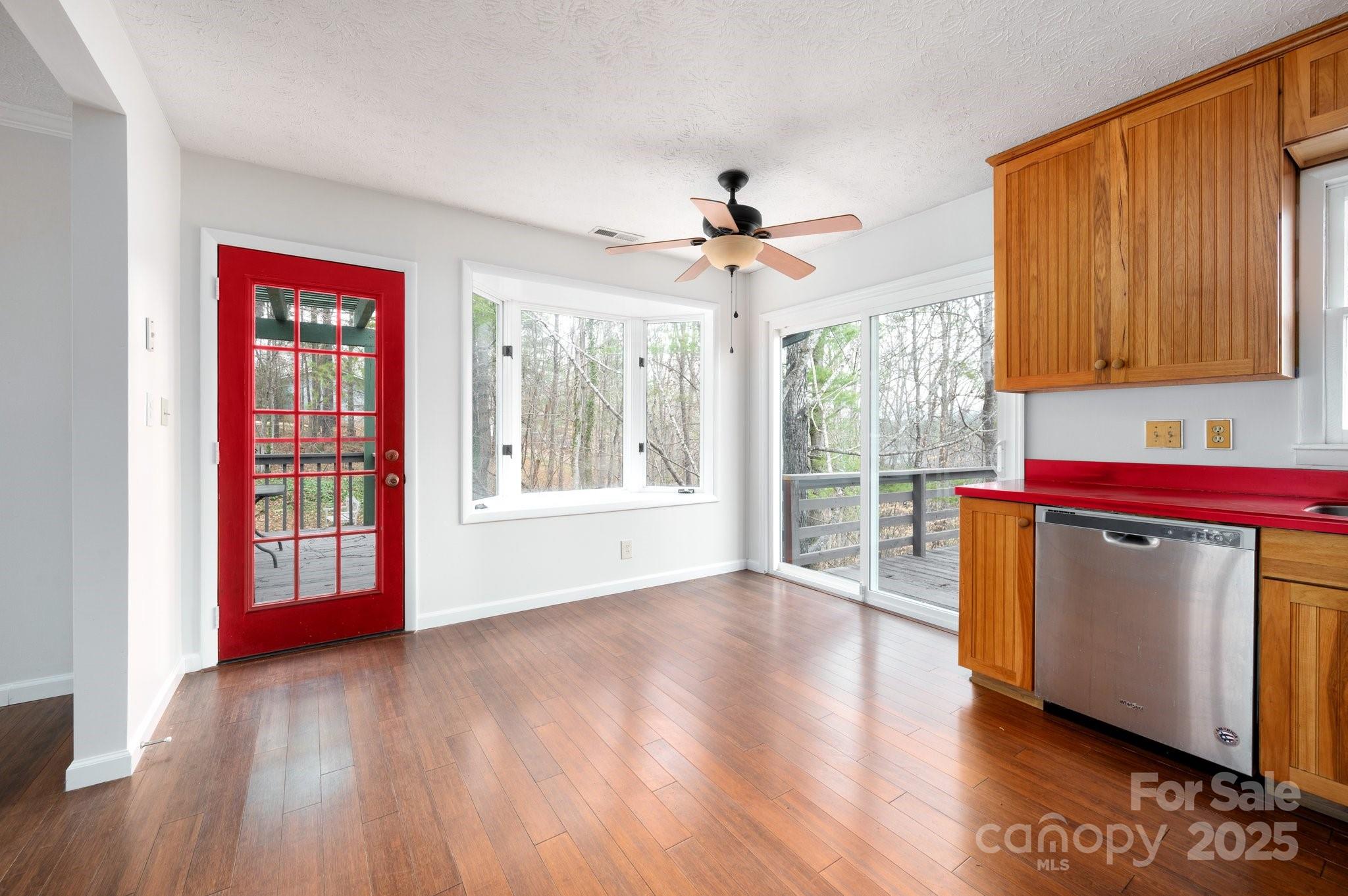 148 Pinecrest Drive Alexander, NC 28701 - Photo 13 of 31 a view of an empty room with window and wooden floor