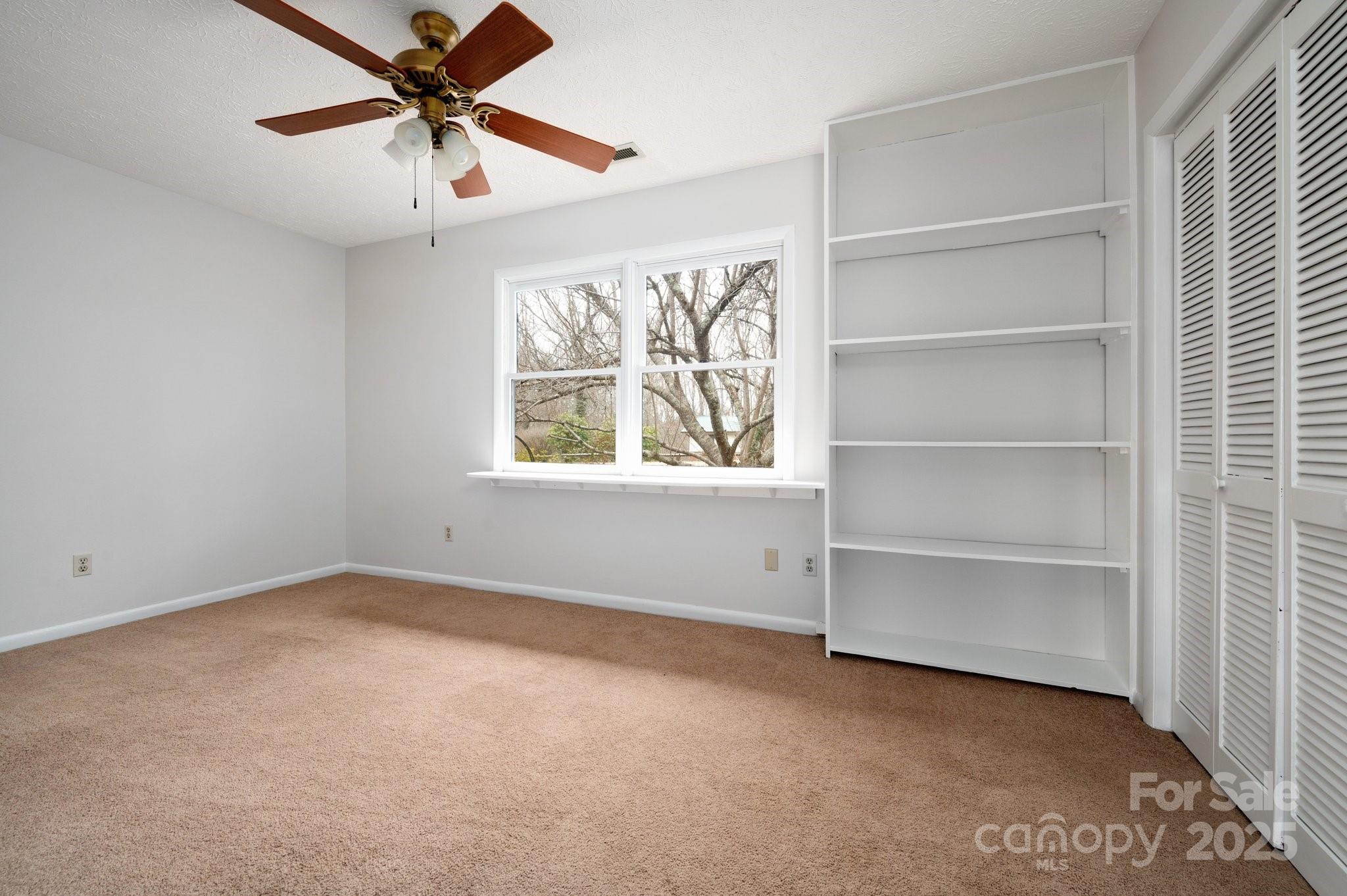148 Pinecrest Drive Alexander, NC 28701 - Photo 17 of 31 a view of an empty room with a window