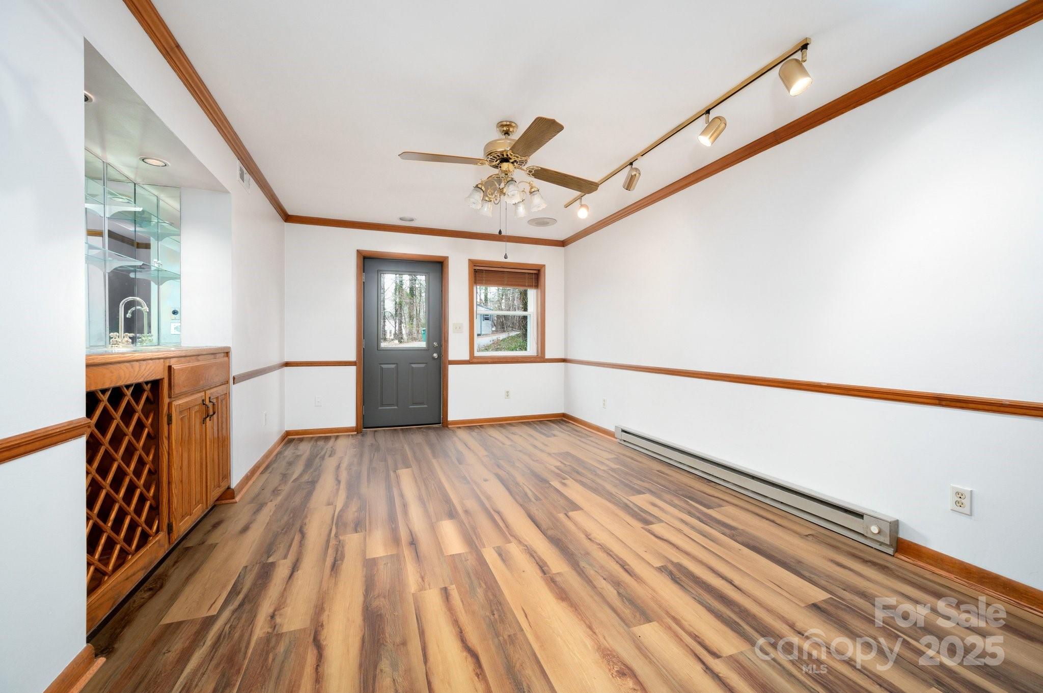 148 Pinecrest Drive Alexander, NC 28701 - Photo 19 of 31 a view of an empty room with wooden floor and a window