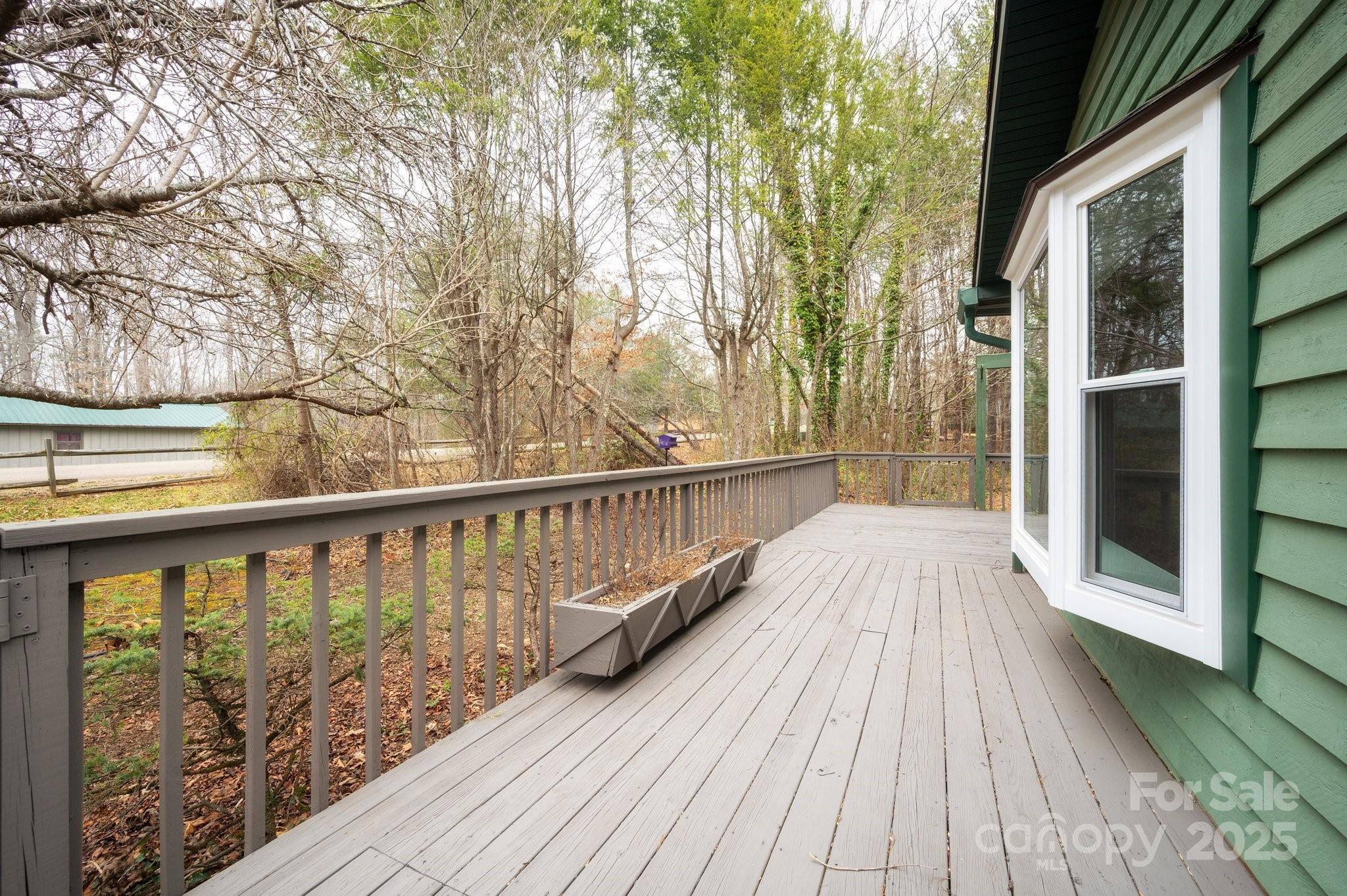 148 Pinecrest Drive Alexander, NC 28701 - Photo 6 of 31 a view of balcony with wooden floor