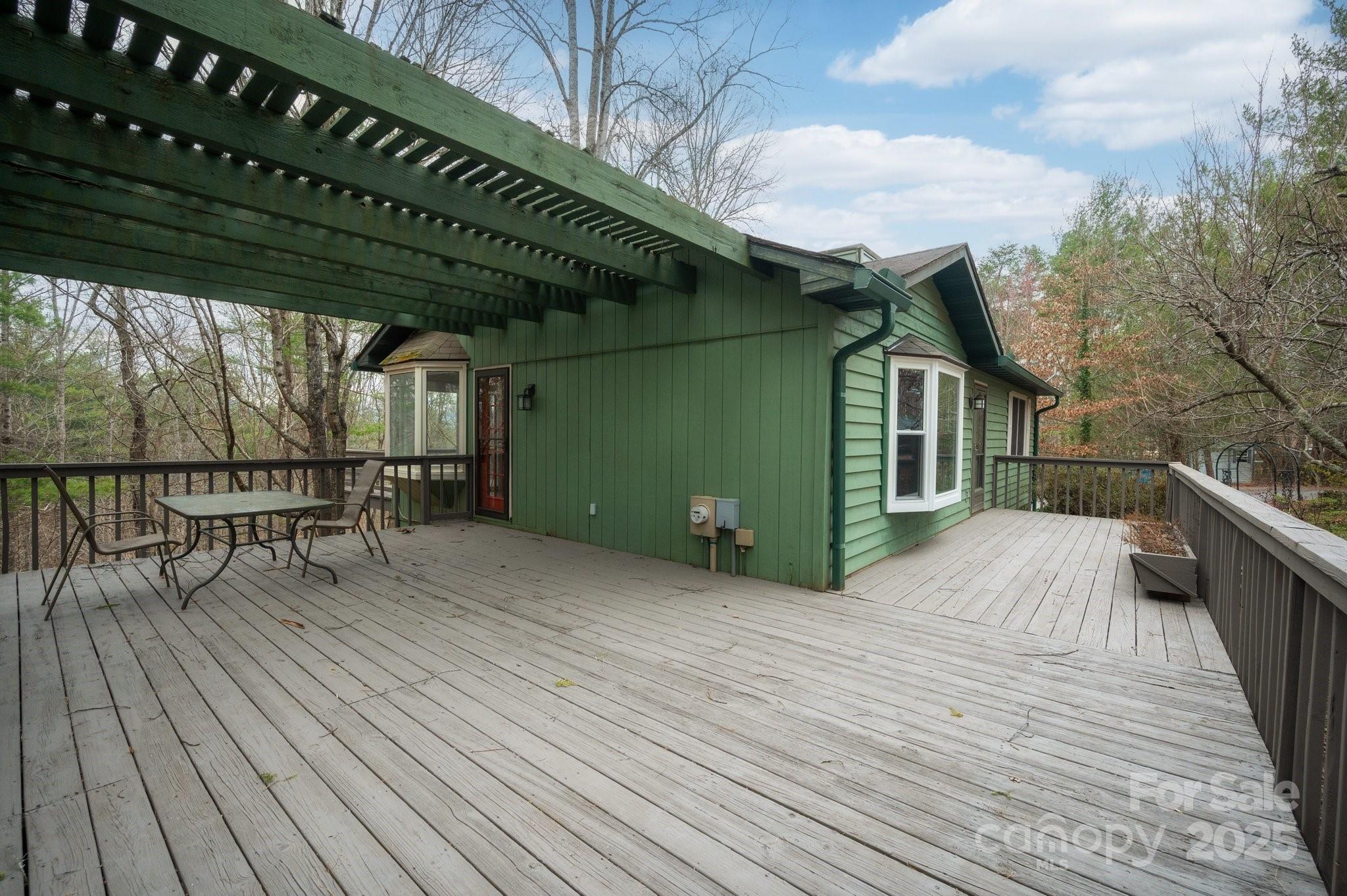 148 Pinecrest Drive Alexander, NC 28701 - Photo 8 of 31 a porch with seating space