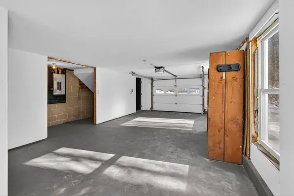 a view of a hallway with closet area