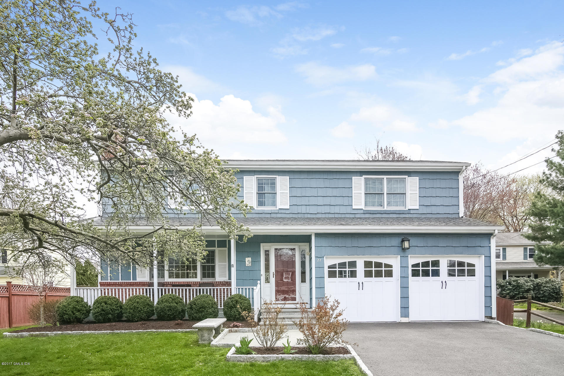 22 Griffith Road Riverside, CT 06878 - Photo 1 of 40 a front view of a house with garden